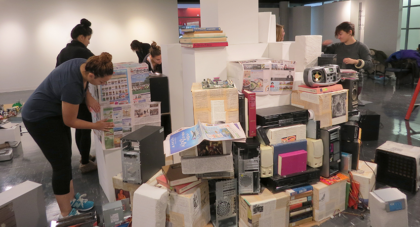 Students create Babel exhibit in Worcester State University's Dolphin art gallery.