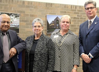About the Photo: From left, President Emeritus Kalyan Ghosh, School of Education, Health and Natural Science Linda Larrivee, Nursing Instructor Cheryl Hersperger, and President Barry Maloney