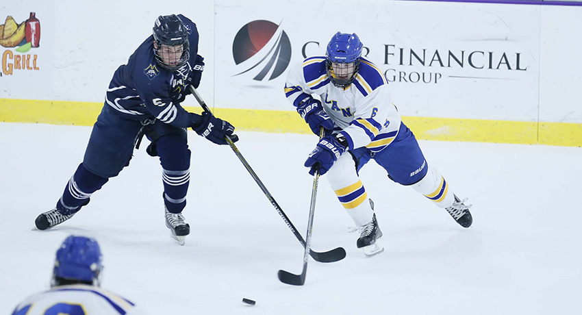 Worcester State University ice hockey player at a game