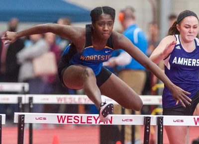 a Worcester State University student-athlete in a hurdle event