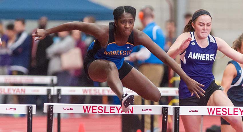 a Worcester State University student-athlete in a hurdle event