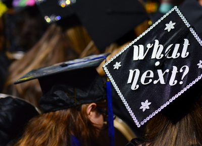 Worcester State University commencement mortarboard with a what's next message