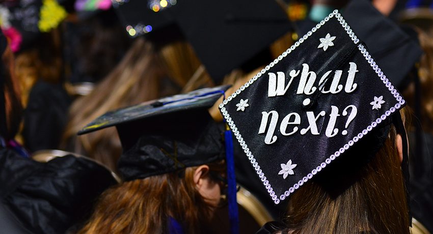 Worcester State University commencement mortarboard with a what's next message