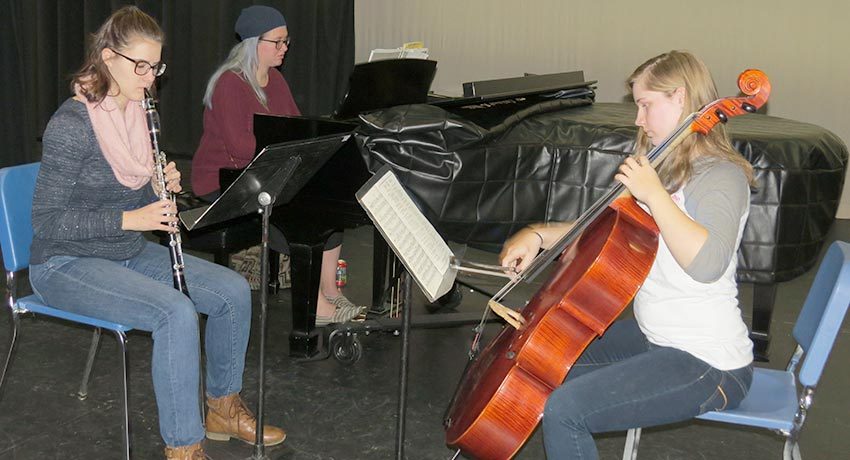 Worcester State trio rehearsing Beethoven Trio B-flat Major