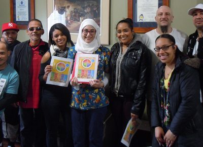 Worcester State students with residents of Reyes House